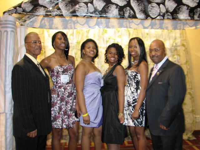 IMG_6734.JPG - Division One Key Clubbers are ready for the Governor’s Banquet.  Past Kiwanis Governor Linwood Watson, an always faithful and attendant Advisor, poses with some of the division’s proud leaders.