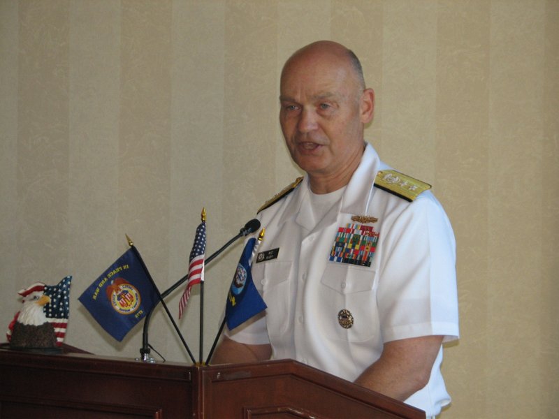 IMG_7756.JPG - The featured speaker for “An Evening Honoring the United States Armed Forces” on May 15th at Kenwood Country Club was Rear Admiral Mark H. Buzby, USN, Commander of the Military Sealift Command.  His Command is responsible for transporting by sea via sixty two ships the huge quantity of goods and supplies needed by the U.S. Armed Forces and DOD organizations throughout the world.  These supplies range from food supplies, to building materials, fuel, weapon systems and ammunition.  It’s a fascinating account of what it takes to back up our forces.
