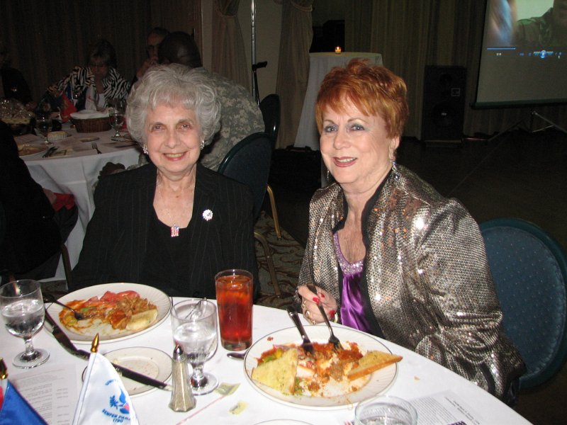 IMG_7769.JPG - Kiwanis Club of Bethesda’s Patsy Jackson and Pat Tiede, Club Secretary, enjoy the tribute to the Armed Services.  They were part of a Bethesda interclub.