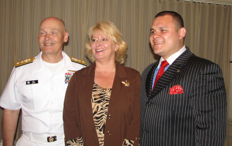 IMG_7780.JPG - Rear Admiral Mark “Buz” Buzby and Mrs. Buzby pose with Kiwanis Club of Potomac President Aaron Ferrufino after the ceremonies concluded.  Thank you again, RADM Buzby for a very interesting address and Q. & A. session.