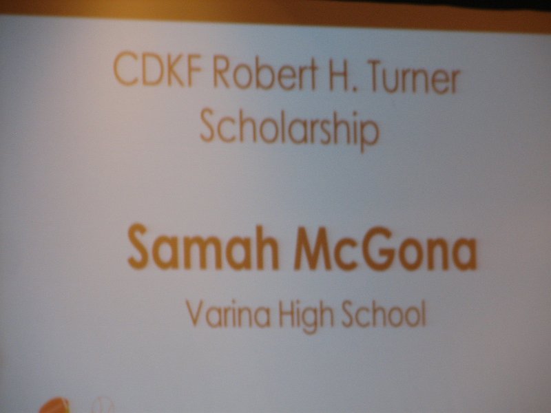 IMG_0862.JPG - The Robert H, Turner Memorial Award is awarded to the top winning candidate.  The 2010-2011 $2,000 Scholarship  Award goes to Past Governor Samah McGona of Varina High School.  The Scholarships are all awarded on the written criteria submitted in the categories of academic attainment, service to their school and to their community, an applicant essay, and three letters of recommendation all evaluated against each other applicant submission.  Congratulations, Samah!  And thanks to all who support your Capital District Kiwanis Foundation !