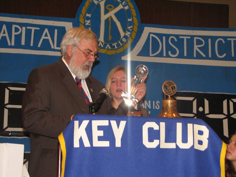 IMG_0887.JPG - District Key Club Administrator Joe Stankus presents the crystal Symbol of Thanks to Governor Rachael Slotter for her dedicated, faithful and outstanding service to Capital District Key Club and to Capital District Kiwanis for the Year 2010-2011.  Thank you and well done!